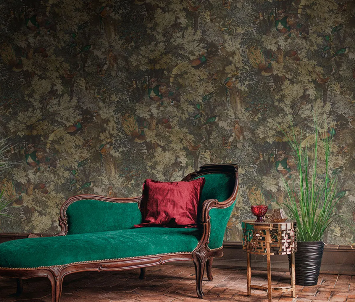 Bird and woodland wallpaper in a furnished living room with a green chaise